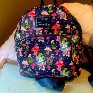 Loungefly Alice In Wonderland backpack. Excellent condition.